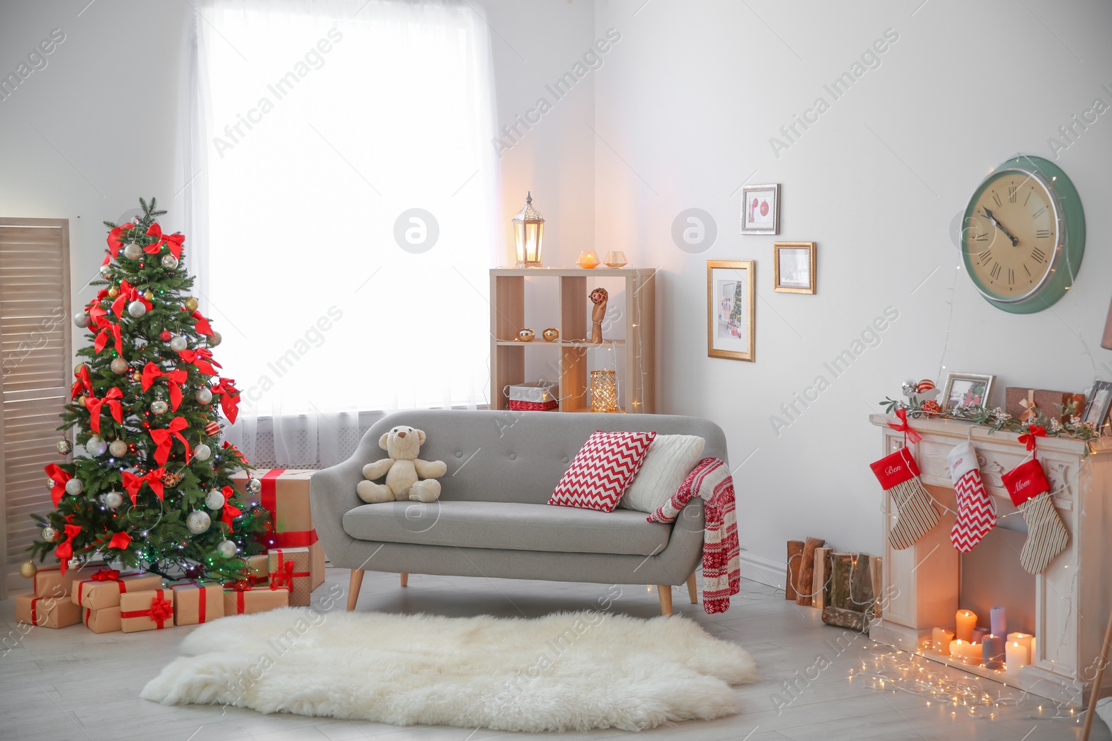 Photo of Room interior with beautiful Christmas tree and gifts