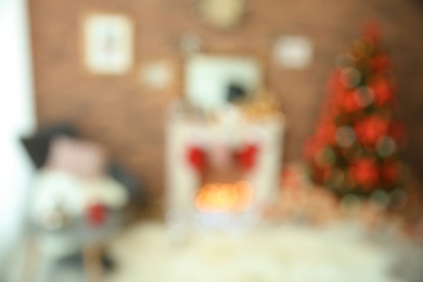 Photo of Blurred view of room with beautiful Christmas tree