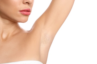 Young woman showing hairy armpit on white background, closeup. Epilation procedure