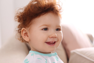 Photo of Portrait of cute little child at home