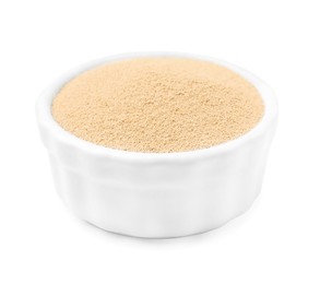 Photo of Granulated yeast in bowl isolated on white