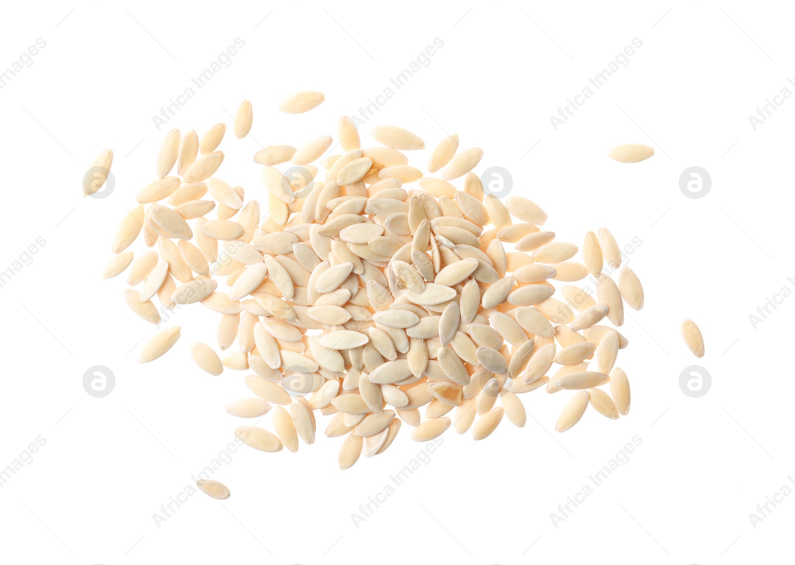 Photo of Pile of raw cucumber seeds on white background, top view. Vegetable planting