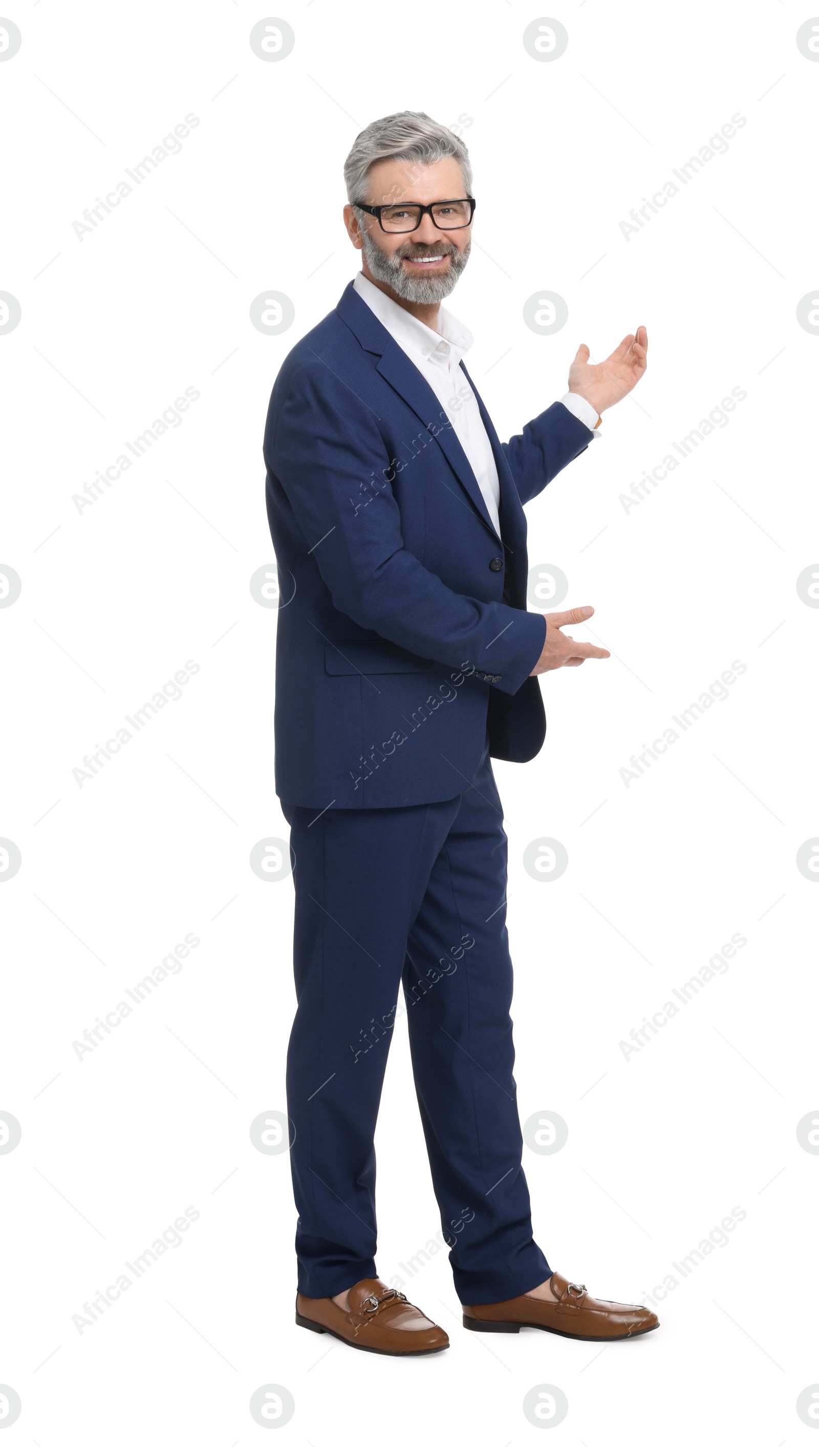 Photo of Mature businessman in stylish clothes posing on white background