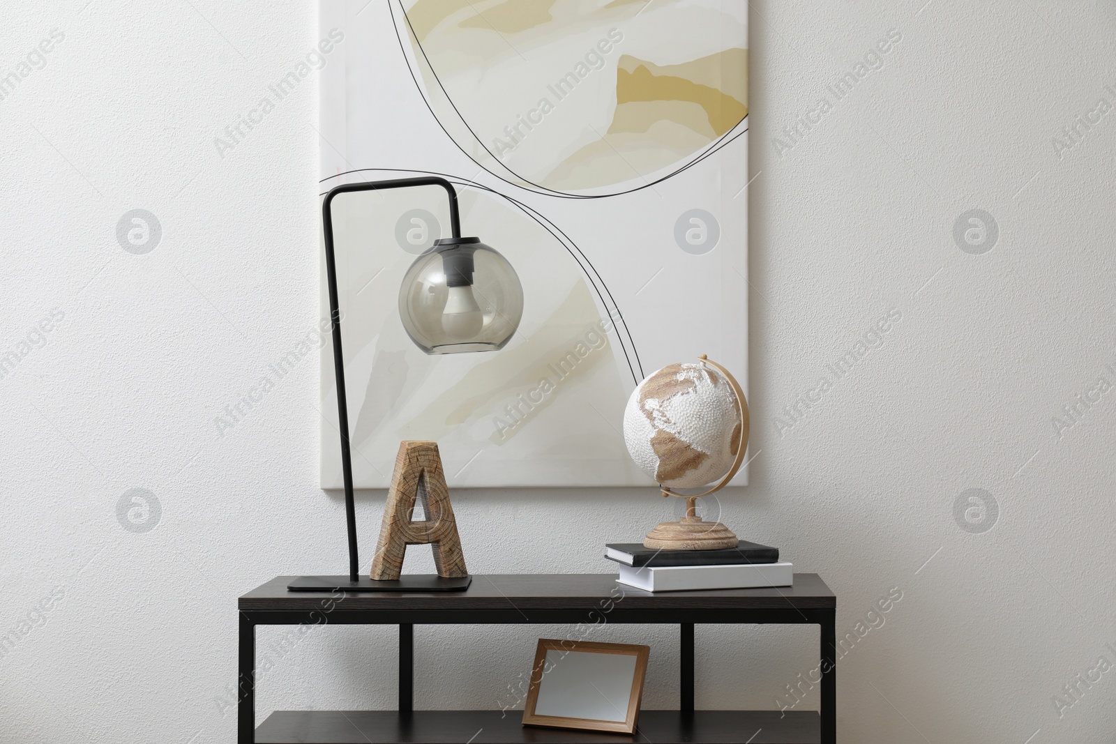 Photo of Light hallway interior with stylish console table