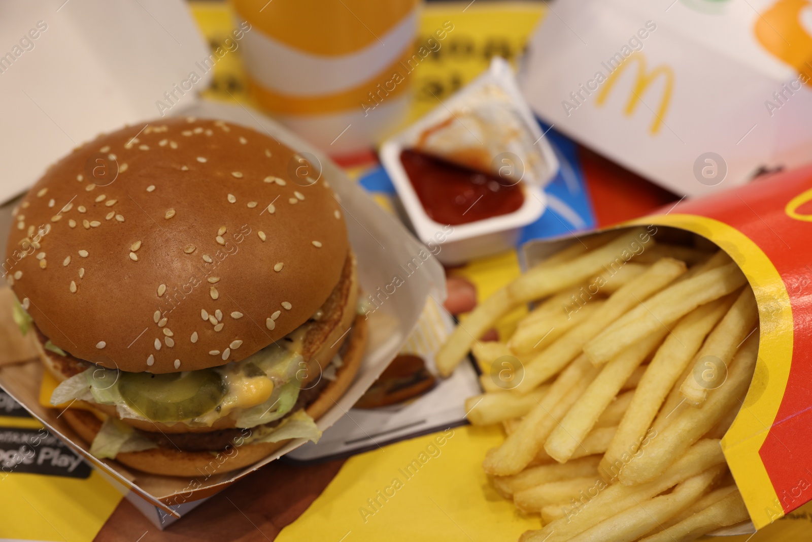 Photo of Lviv, Ukraine - October 9, 2023: McDonald's menu on table in restaurant, closeup