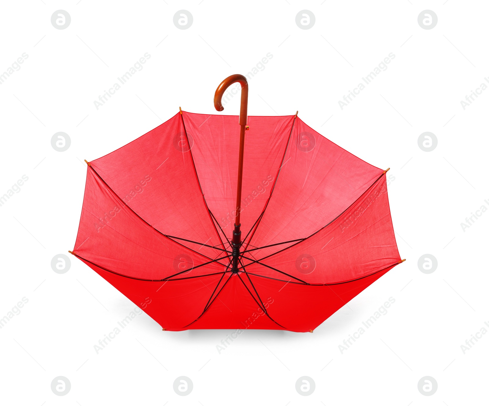 Photo of Modern opened red umbrella isolated on white