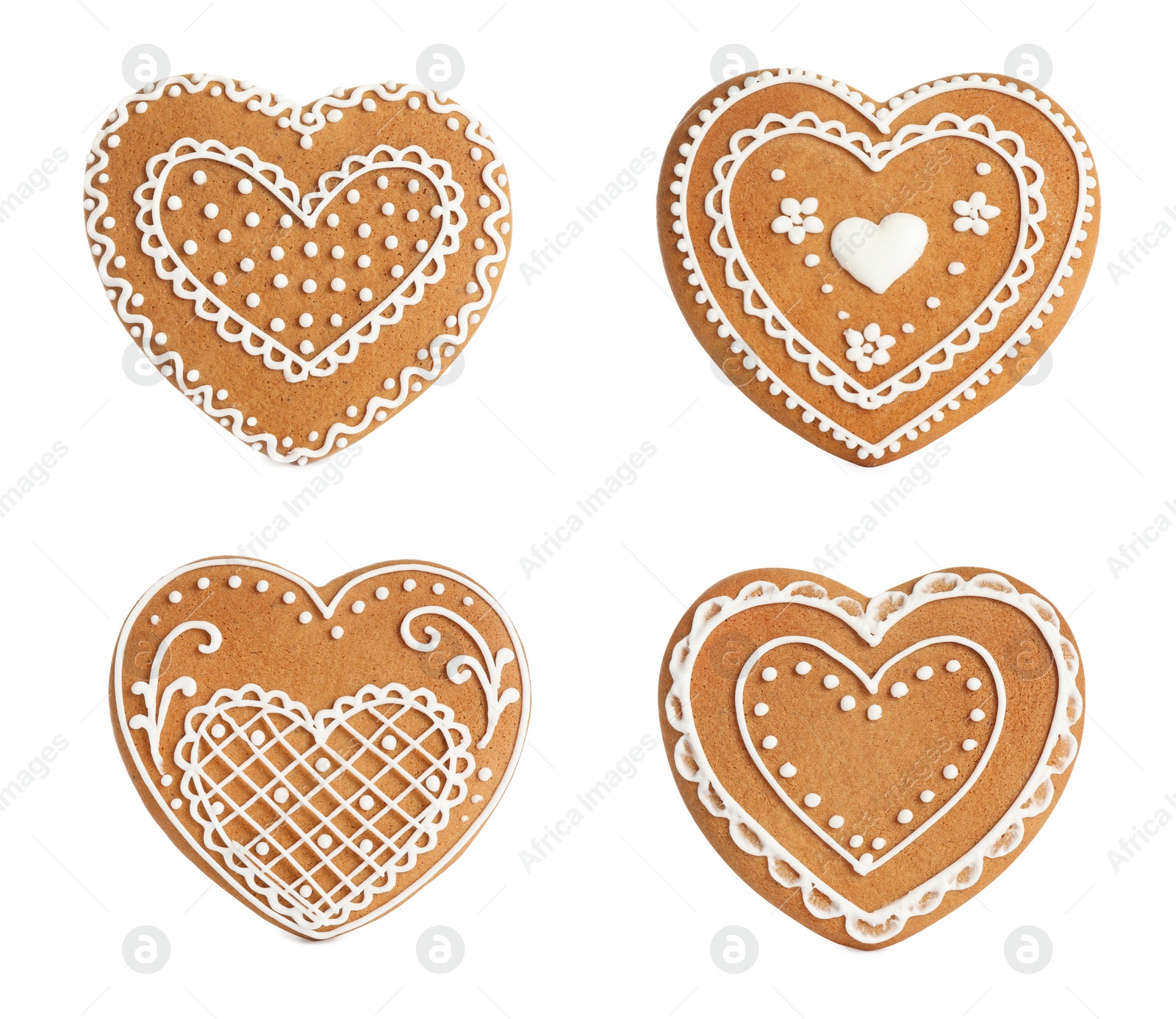 Image of Set of Christmas gingerbread heart shaped cookies on white background