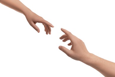 Photo of Man and woman reaching to each other on white background, closeup of hands