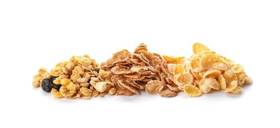 Different types of dry breakfast on white background. Healthy grains and cereals