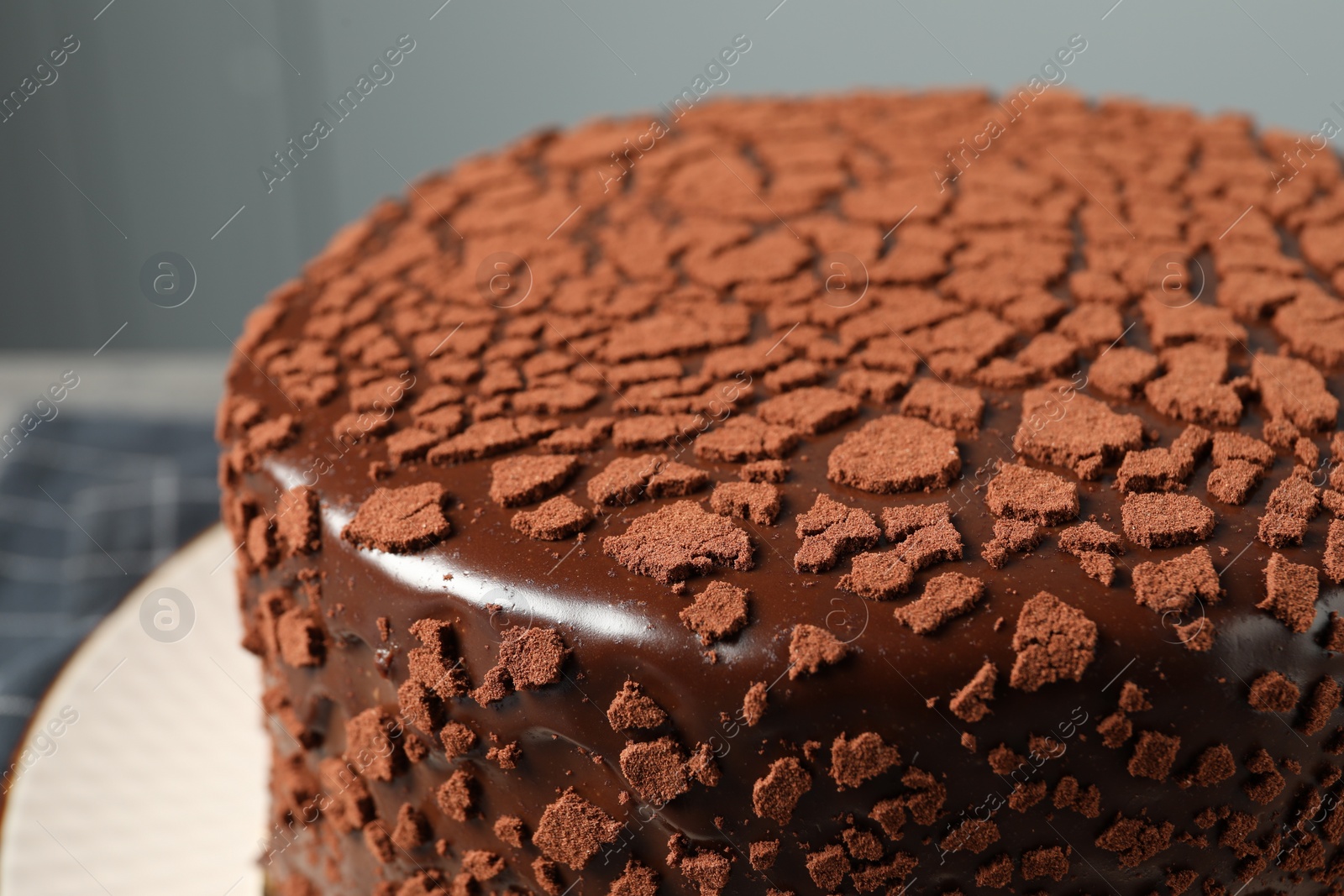 Photo of Delicious chocolate truffle cake on table, closeup