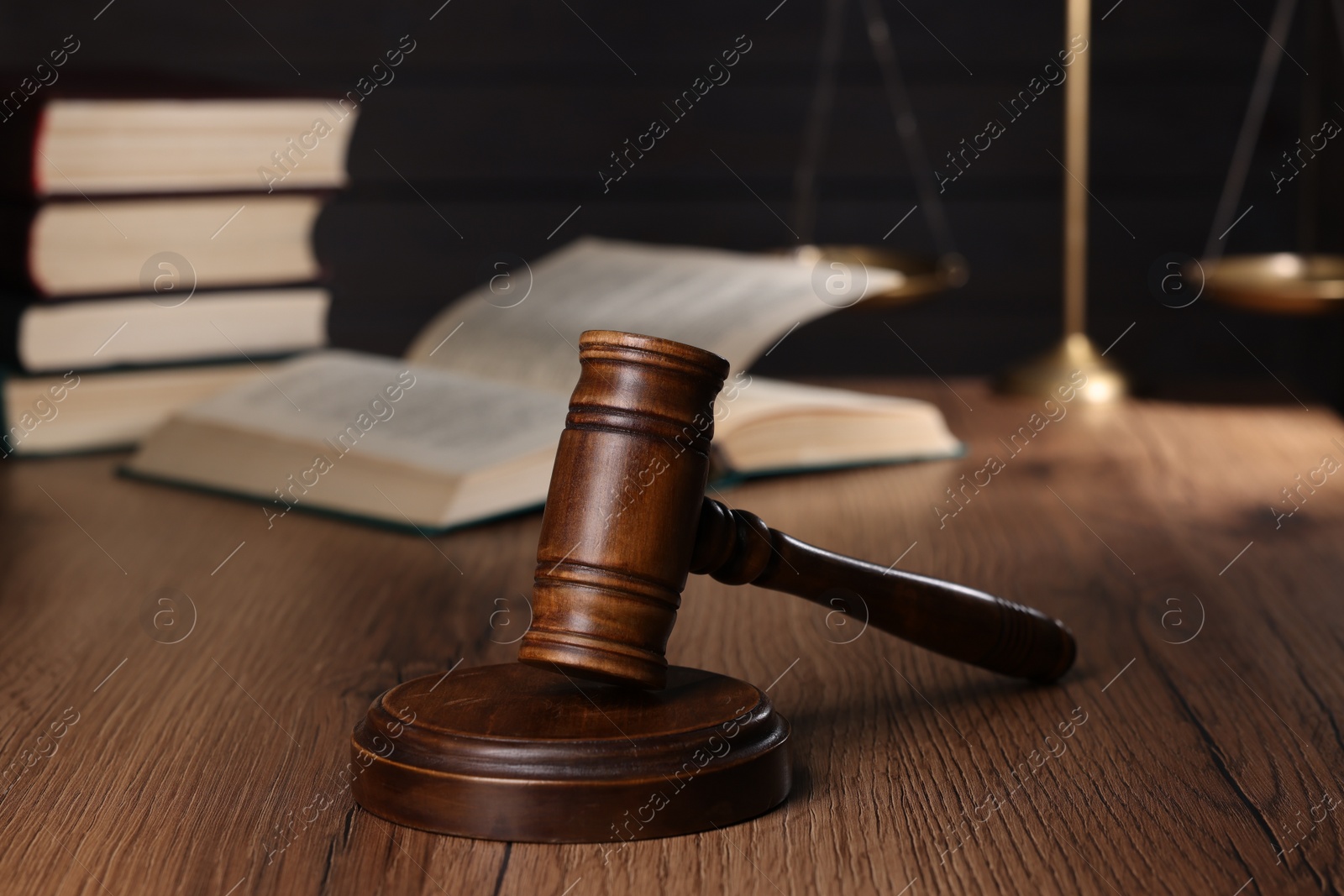 Photo of Law concept. Judge's gavel on wooden table