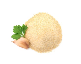 Pile of dry garlic powder and parsley on white background, top view