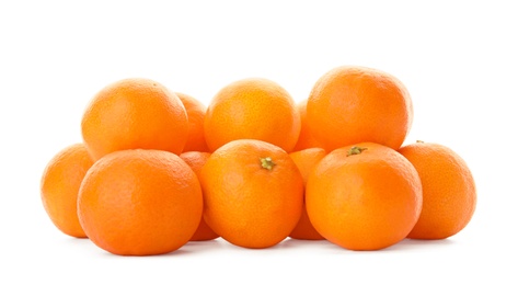 Heap of fresh ripe tangerines on white background