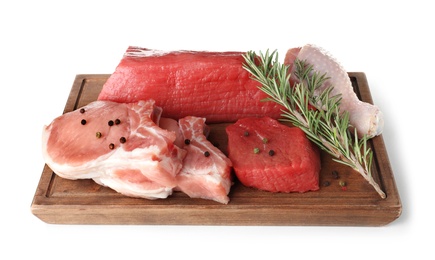 Photo of Board with various raw meats and spices on white background