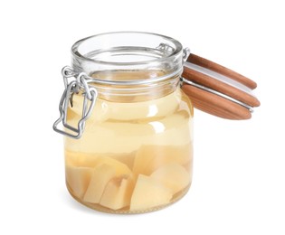 Photo of Delicious quince drink in glass jar isolated on white