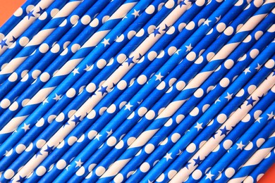 Many paper drinking straws as background, top view