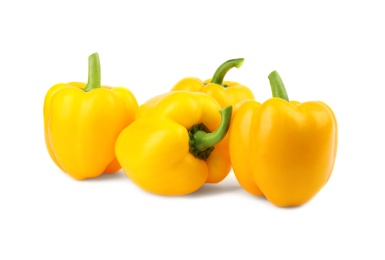 Photo of Ripe yellow bell peppers isolated on white