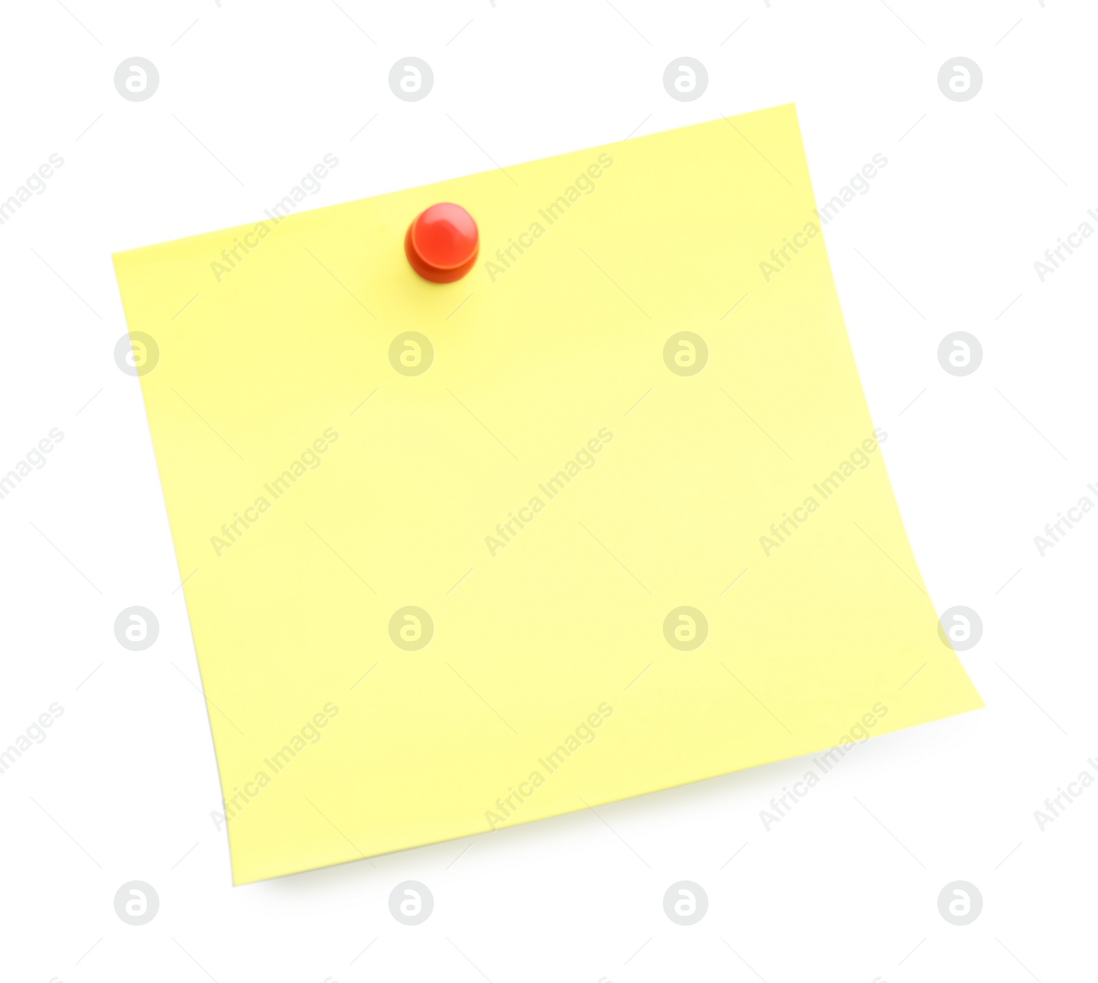 Photo of Blank yellow note pinned on white background, top view