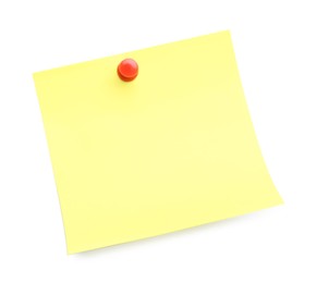 Photo of Blank yellow note pinned on white background, top view