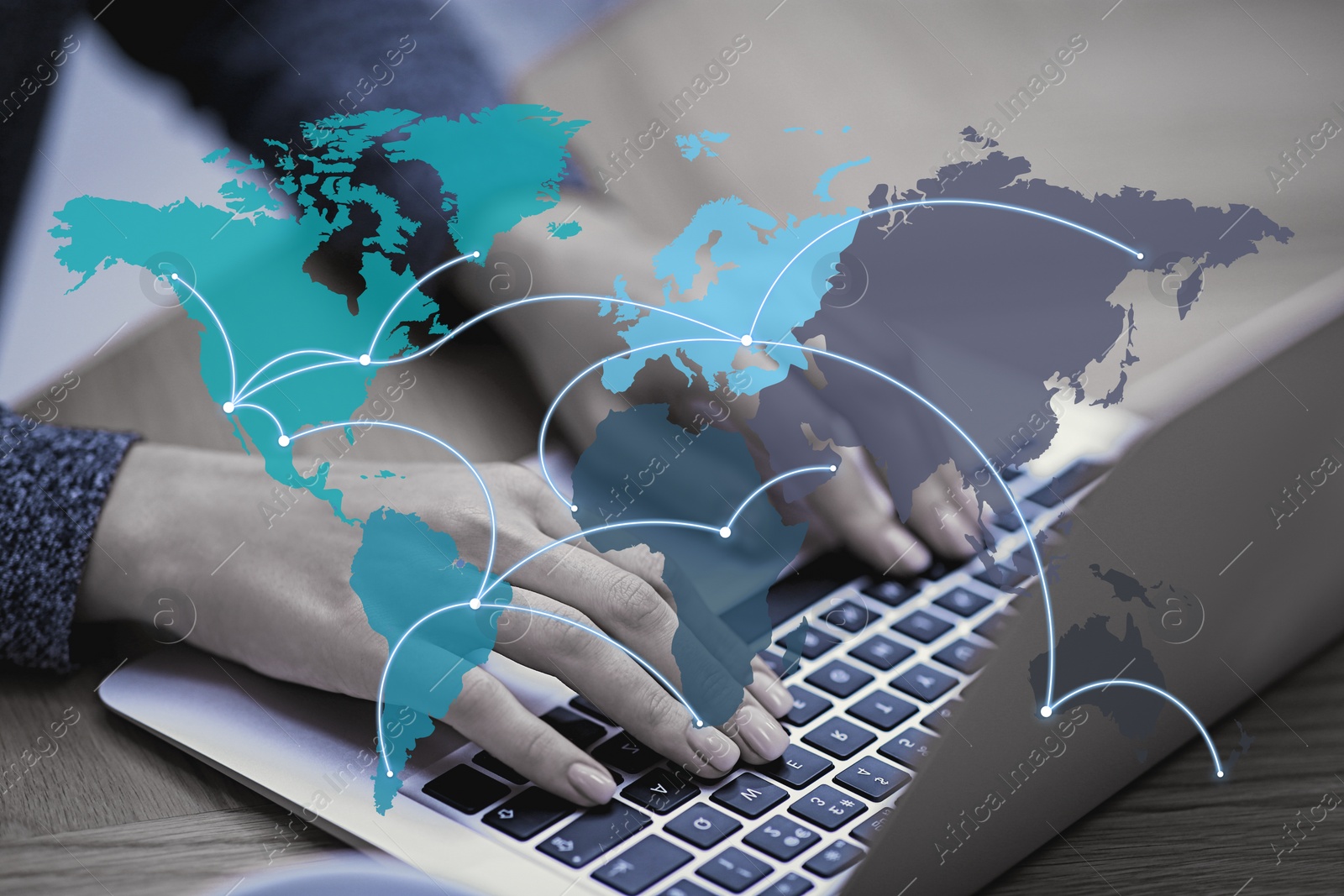 Image of Wholesale and logistics concept. Woman using laptop in office, world map illustration on foreground