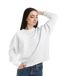 Photo of Portrait of young woman in sweater isolated on white. Mock up for design