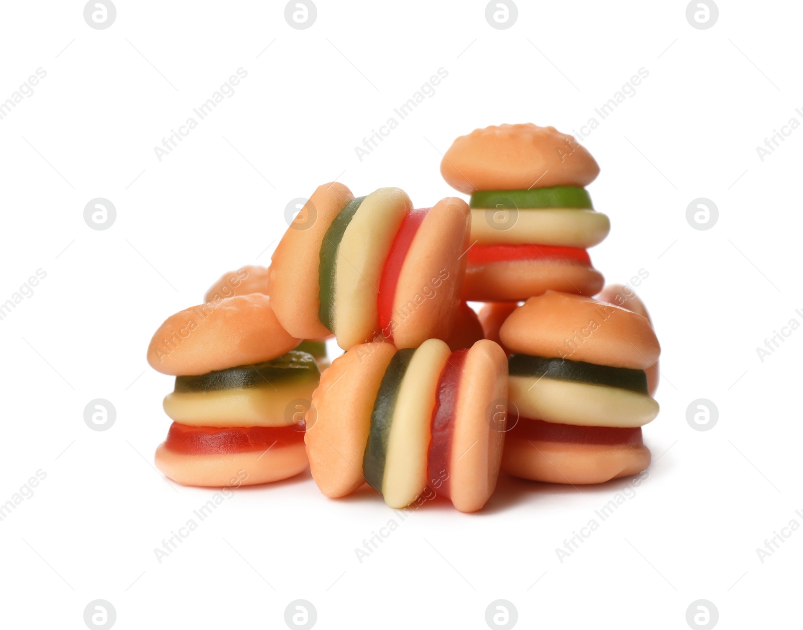 Photo of Pile with jelly candies in shape of burger on white background