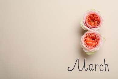 Photo of 8 March greeting card design with roses and space for text on beige background, flat lay. International Women's day