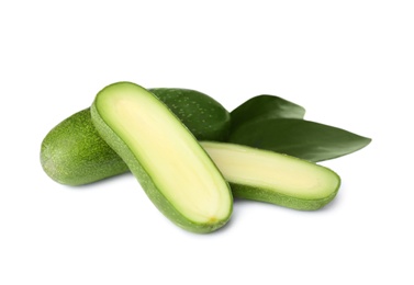 Photo of Cut and whole seedless avocados with leaves isolated on white