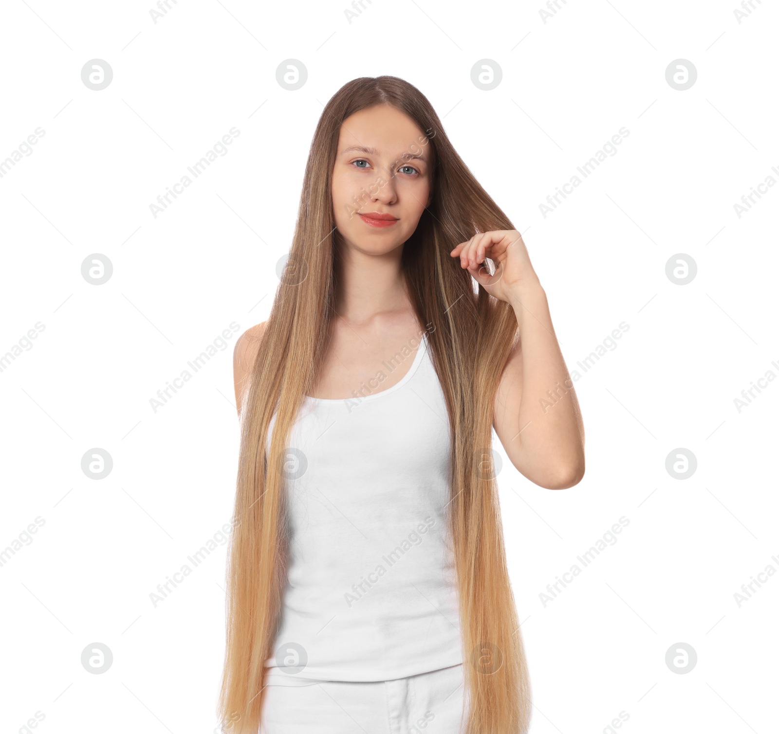 Photo of Teenage girl with strong healthy hair on white background