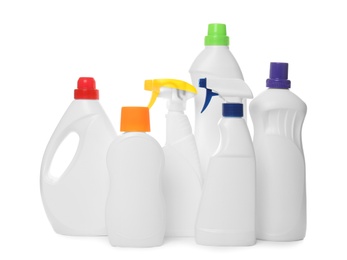 Photo of Bottles of different cleaning products on white background