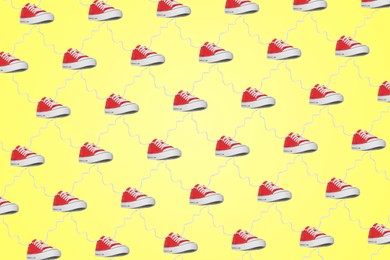 Image of Collage of classic old school red sneakers on yellow background