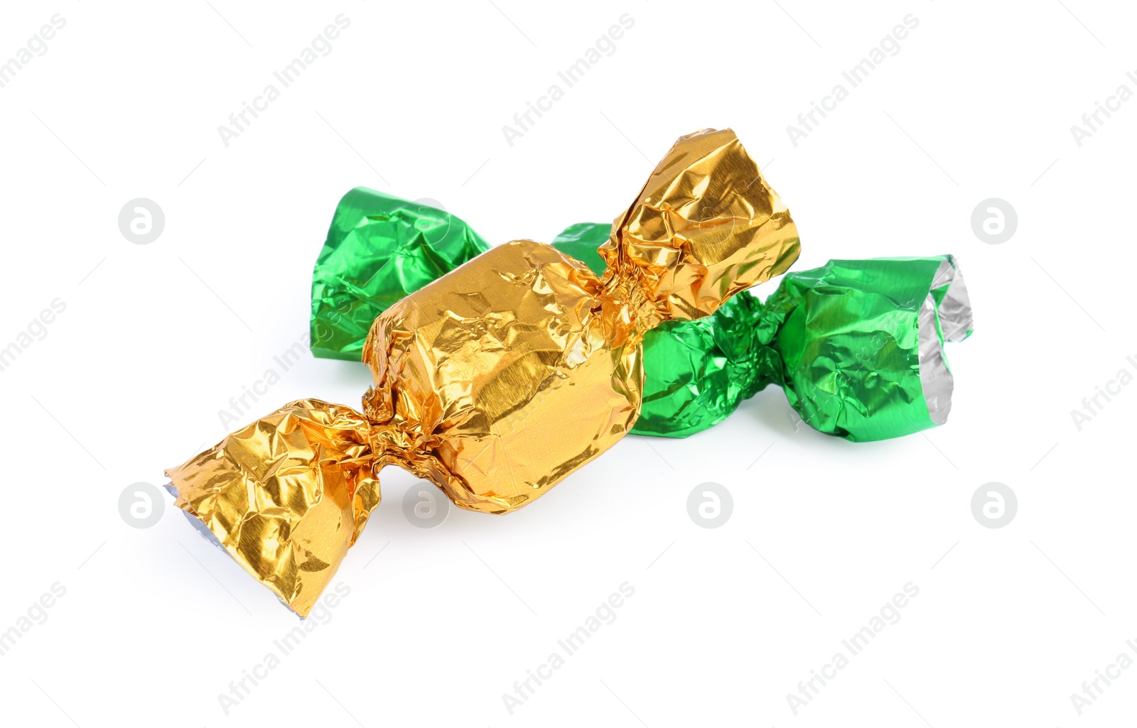 Photo of Tasty candies in colorful wrappers isolated on white