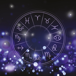 Illustration of  zodiac wheel with astrological signs on dark background. Bokeh effect