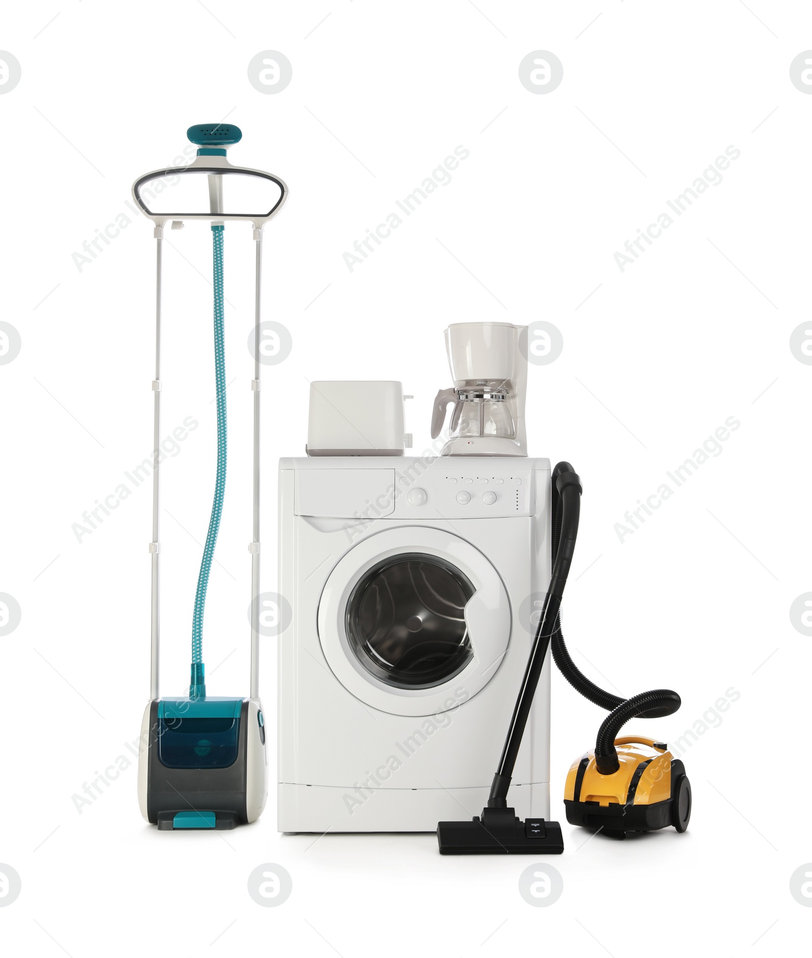 Photo of Set of different home appliances with vacuum cleaner on white background