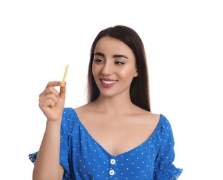 Photo of Beautiful young woman with French fries on white background