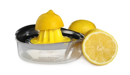 Photo of Metal juicer and fresh lemons on white background