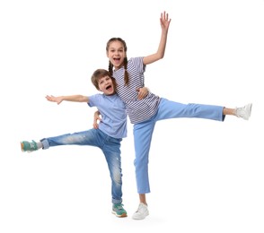 Happy brother and sister on white background