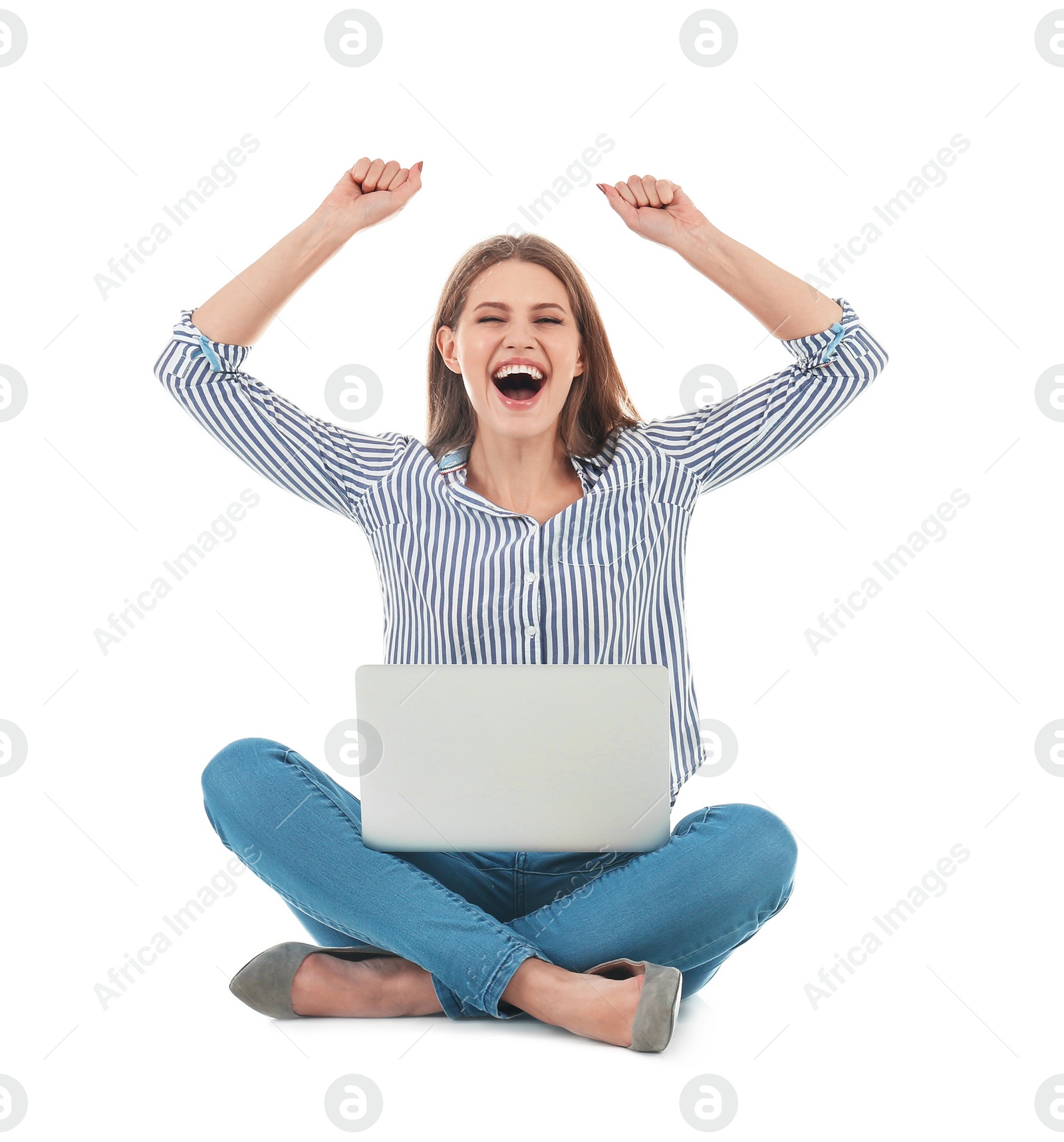 Photo of Emotional young woman with laptop celebrating victory on white background