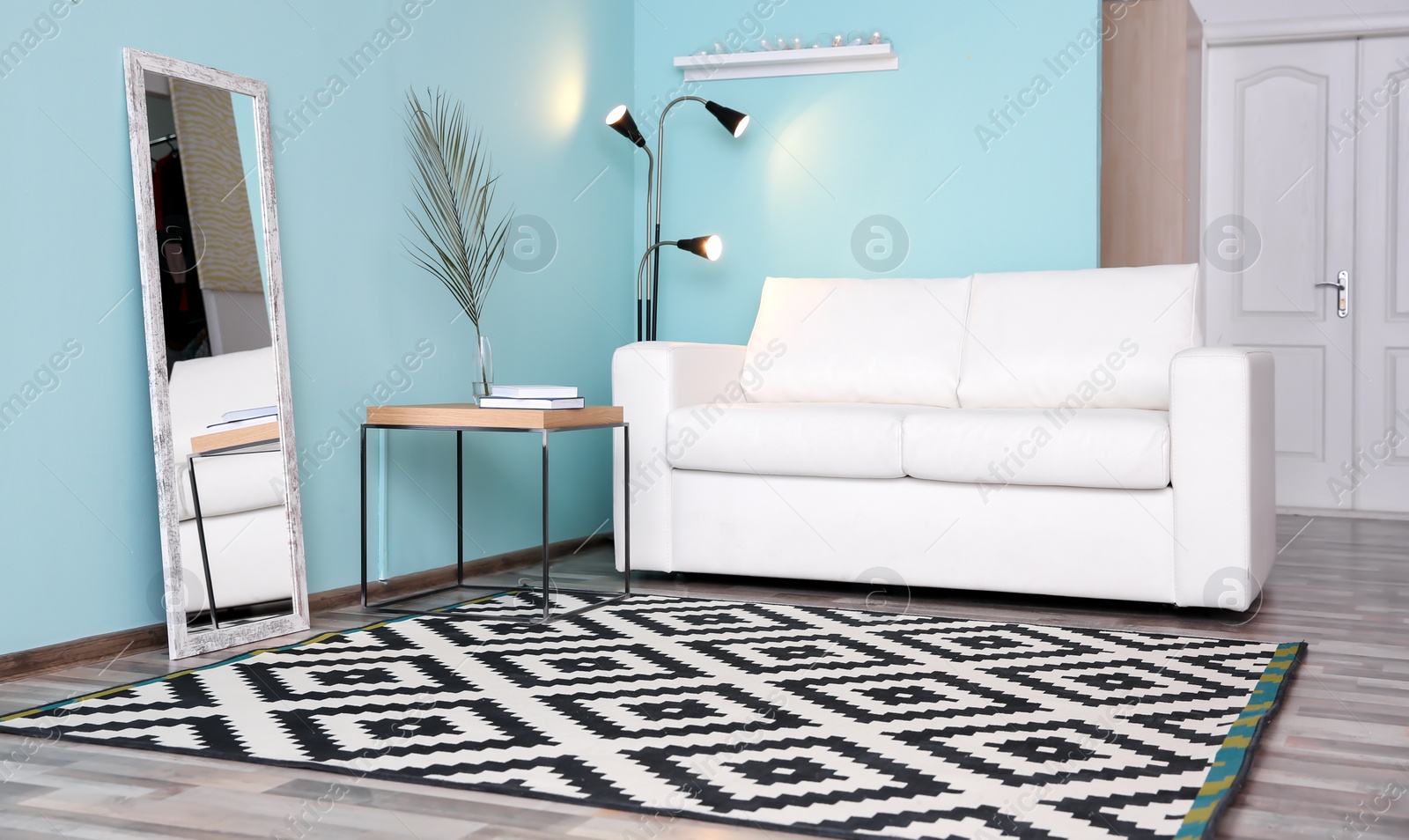 Photo of Modern living room interior with stylish sofa and carpet