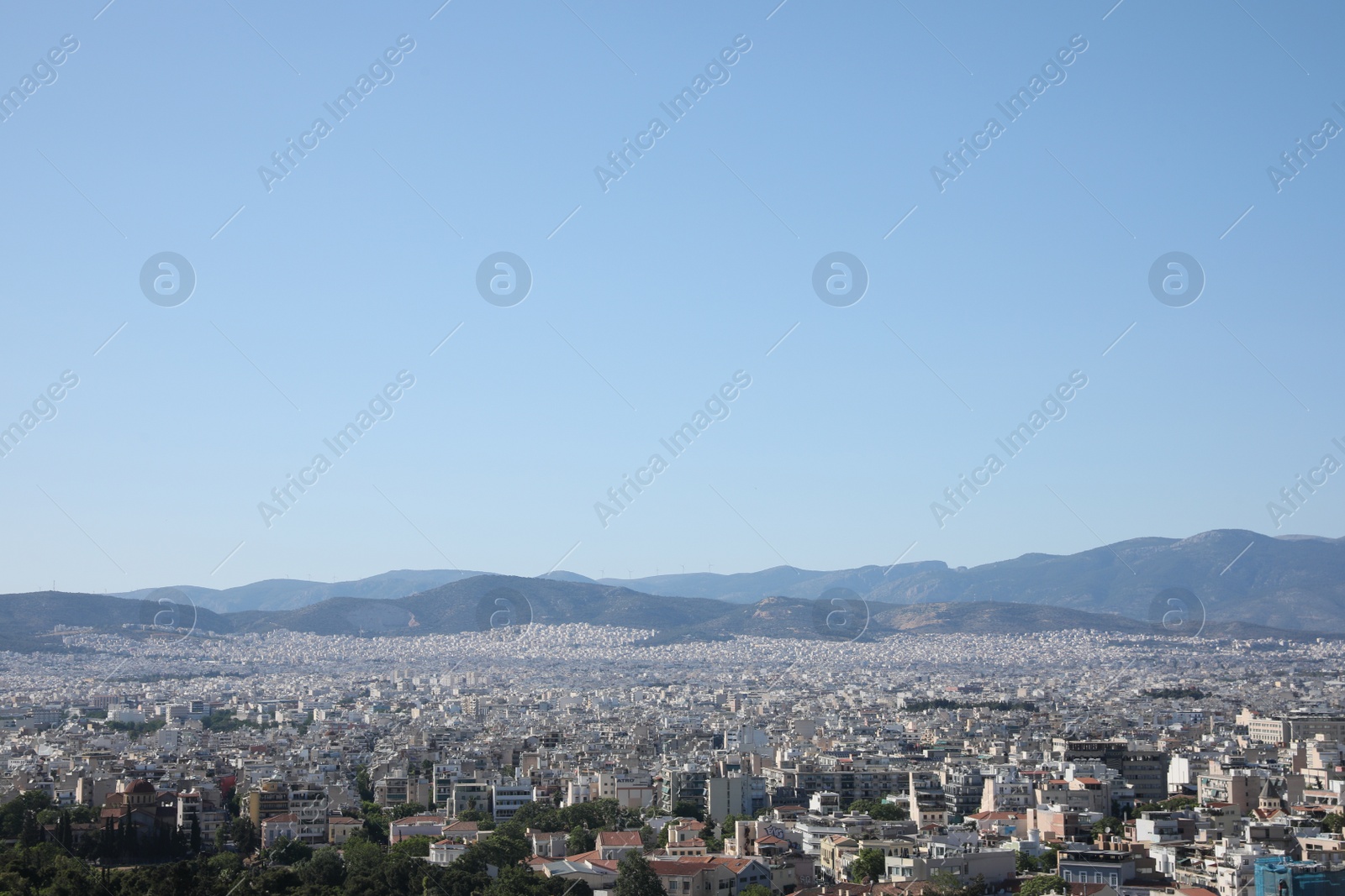 Photo of Picturesque view of cityscape with beautiful houses on sunny day