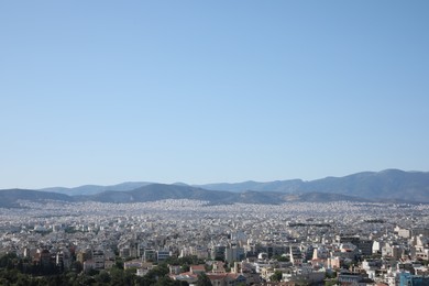 Photo of Picturesque view of cityscape with beautiful houses on sunny day