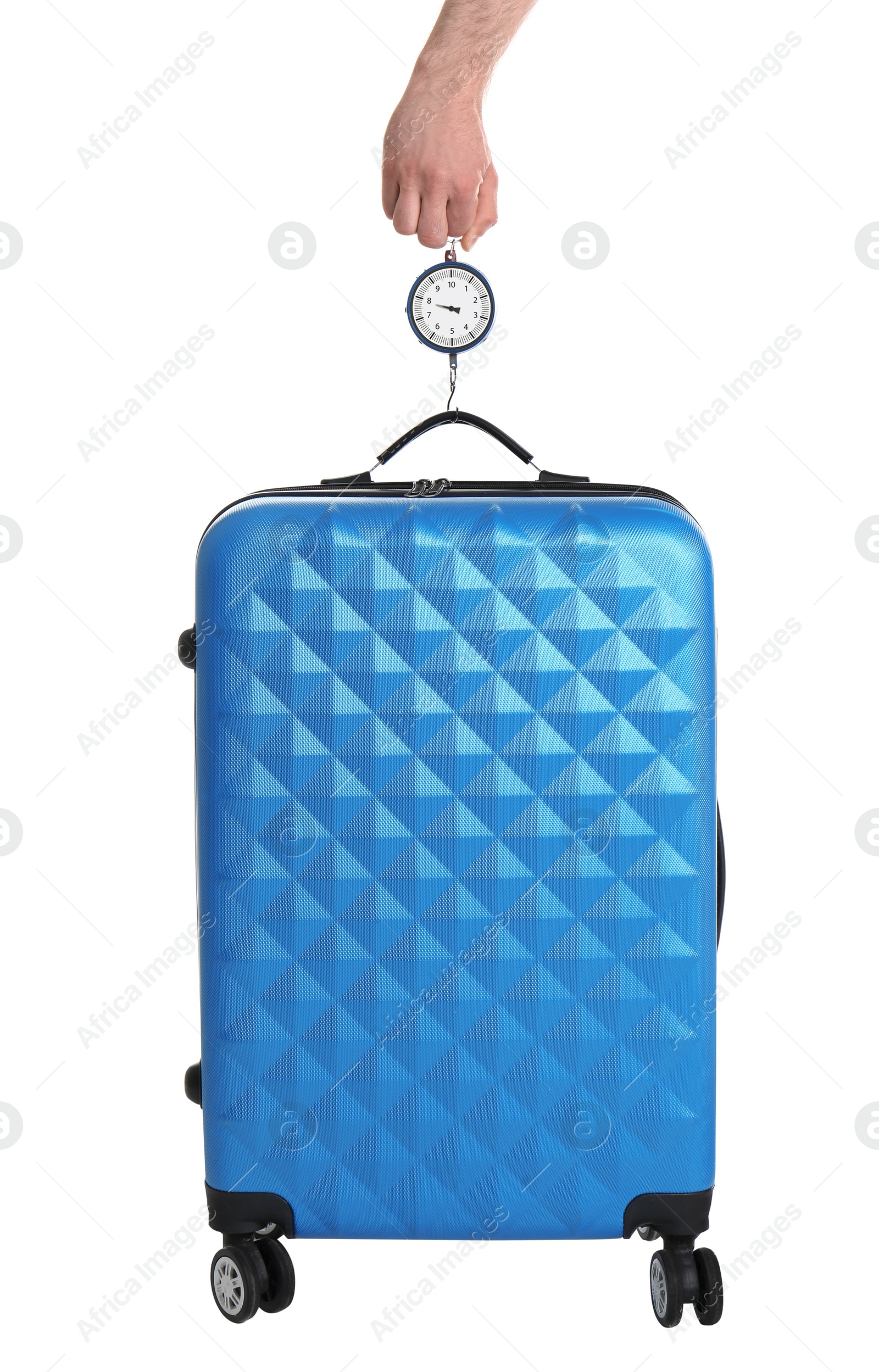 Photo of Man weighing stylish suitcase on white background