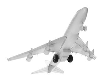 Toy airplane isolated on white. Travel concept