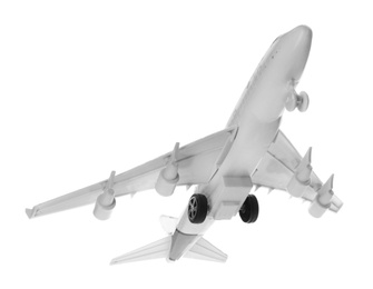 Photo of Toy airplane isolated on white. Travel concept