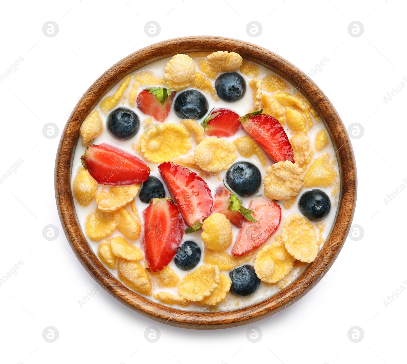 Photo of Bowl of tasty crispy corn flakes with milk and berries isolated on white, top view