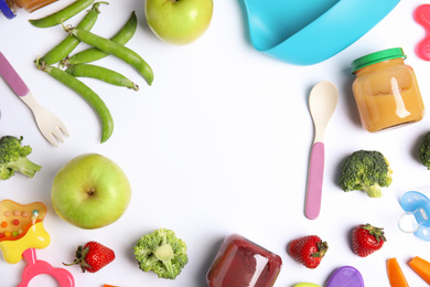 Frame of healthy baby food, ingredients and accessories on white background, flat lay. Space for text