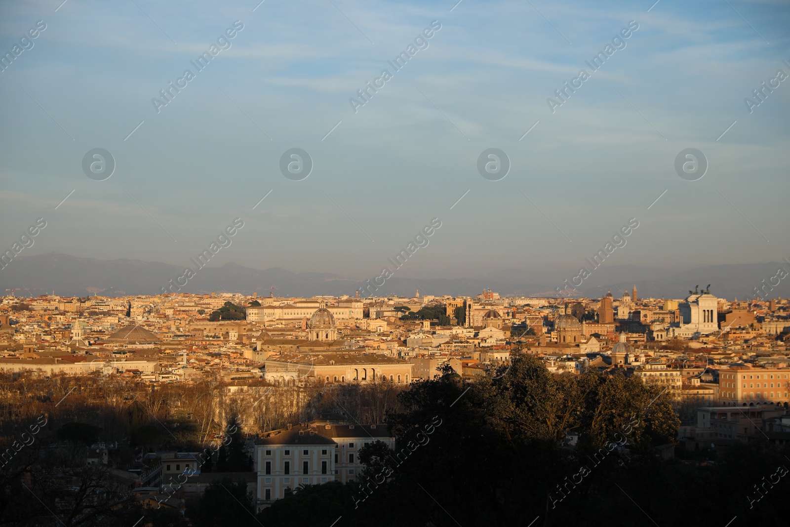 Photo of Picturesque view of city with buildings in evening