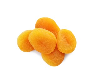 Photo of Pile of tasty apricots on white background, top view. Dried fruits