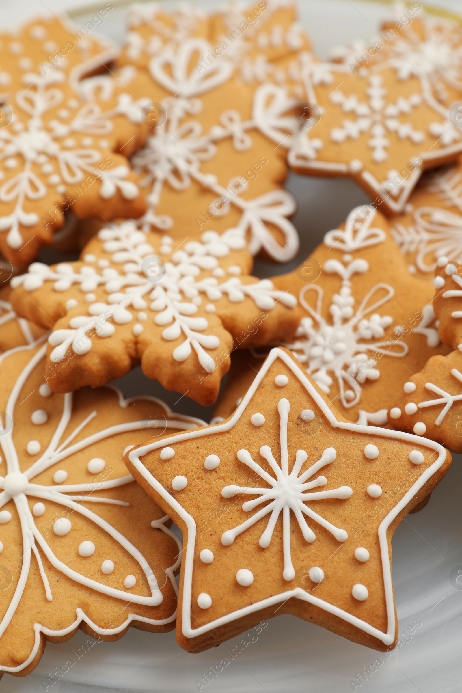 Photo of Tasty Christmas cookies on plate, closeup view