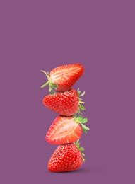 Image of Stack of fresh strawberries on pale purple background